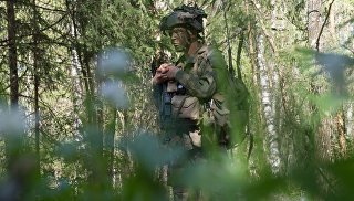 Солдат во время учений Spring Storm Вооруженных сил Эстонии. 22 мая 2017