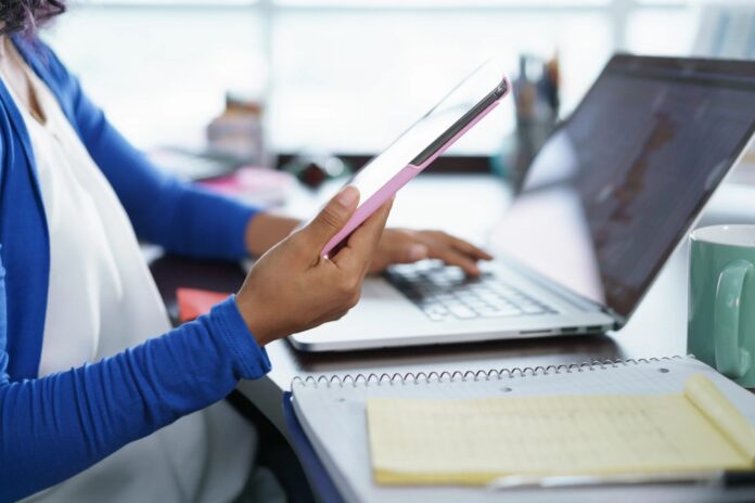 canva latina girl studying at home with laptop computer scaled 1.jpg